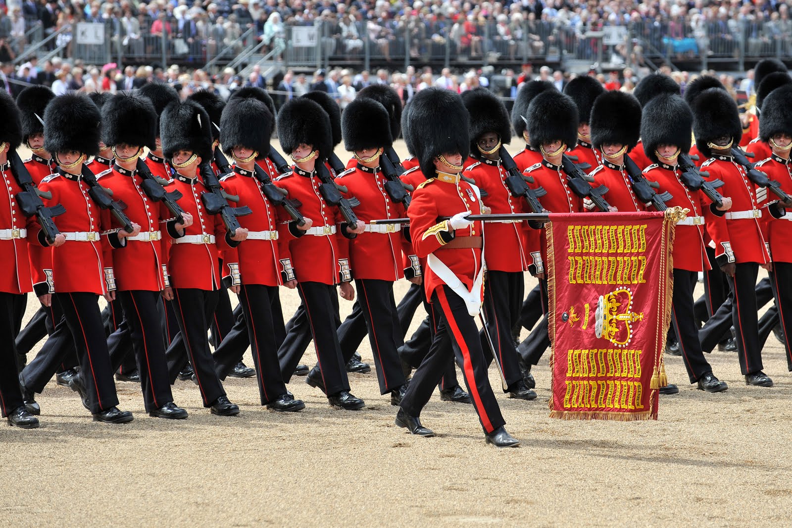 In plain English.: THE TRADITION OF TROOPING THE COLOUR